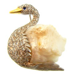 E. WOLFE, perle baroque, diamant et cygne en platine