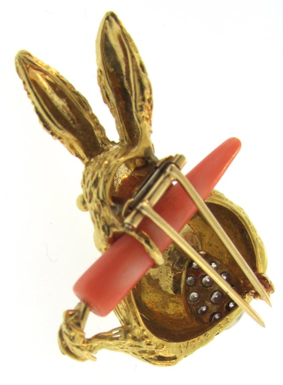 Cute as a bunny, a wonderful 18 karat gold and coral rabbit with diamond tail clip- brooch.