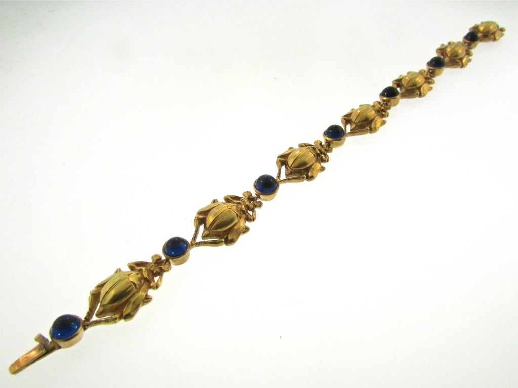 Egyptian Revival Gold and Sapphire Scarab Bracelet
American
Circa 1890