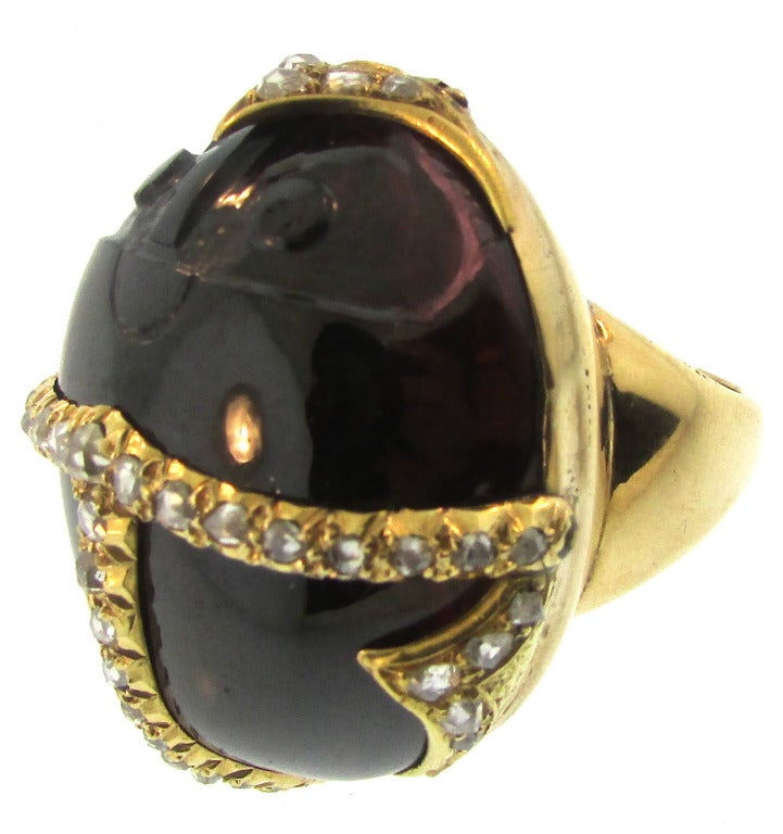 Egyptian Revival Garnet Gold and Diamond Scarab Ring
English
Circa 1870
