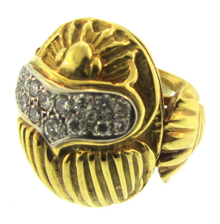 Egyptian Revival Gold and Diamond Scarab Ring
Italian
Circa 1970