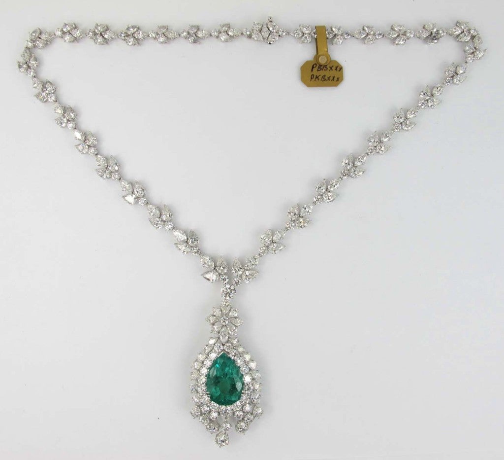The Necklace is 15.44 cts Emerald (Columbia Miner) and 44.54 cts Diamond approximately G/H Color, VS clarity.