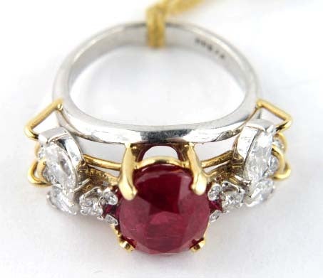 TIFFANY & CO. Ruby Diamond Platinum Yellow Gold Ring. The total weight of the ring is 8.9grams. The total weight of the diamonds 1ct. The total weight of the Burma ruby 5.5 cts.