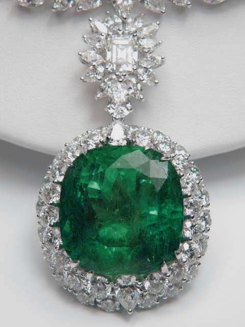 Platinum Emerald Diamond Necklace. A very beautiful piece necklace and precious jewelry.The weight of the diamond is 95.14 carats features F color and VVS clarity and the extraordinary emerald piece weight 68.88 carats