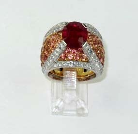 Chanel 18K Yellow Gold and Platinum Ruby Diamond Ring The total weight of the ring is 16grams The total weight of the diamonds 3.5cts The total weight of the ruby 5.5cts