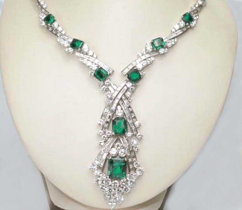 ASPREY 18K WHITE GOLD DIAMOND EMERALD NECKLACE.The total weight of the the necklace is 96 grams. The weight of the diamond is around 36 ct. The weight of the emerald is 30 ct. The length of the necklace is 18