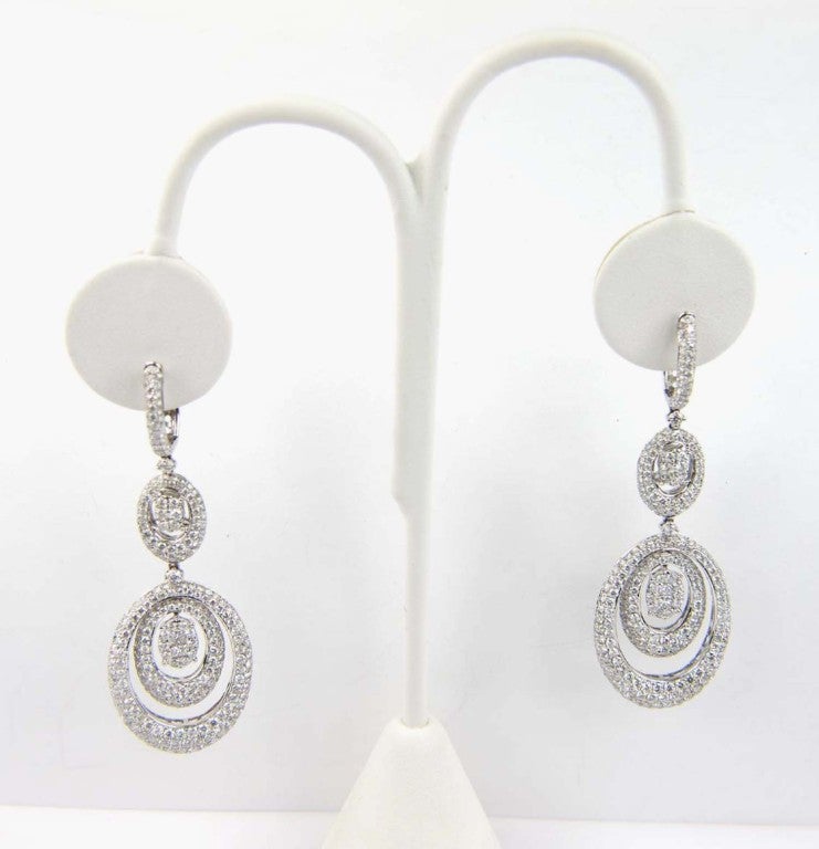 18K White Gold Diamond Earrings. The weight of the Earrings is 16.2 grams. The total weight of the diamond is 8.5 cts approximately, H Color, VS Clarity. The Earrings is 2.4