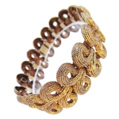 Elegant Spiral Rope Inspired Gold Link Bracelet