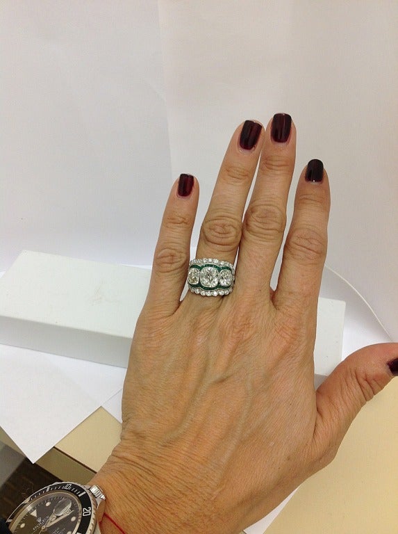 Women's Spectacular Emerald Three Diamond Ring