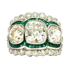 Retro Spectacular Emerald Three Diamond Ring