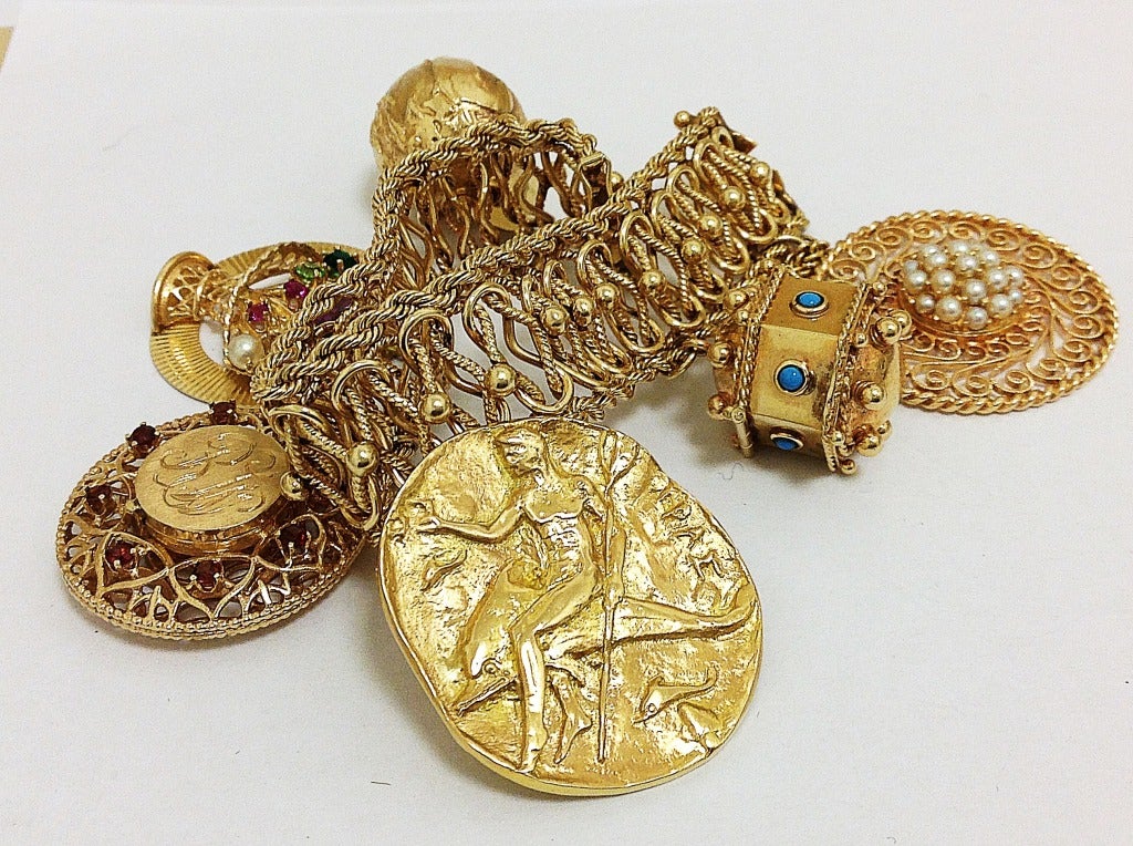 Opulent Chunky Gold Charm Bracelet