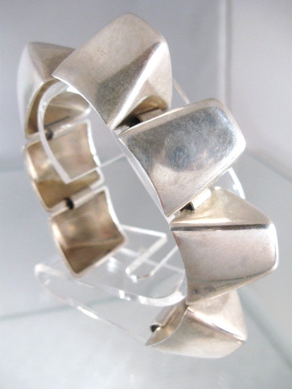 Rare Georg Jensen streamed lined pyramidal shaped link bracelet. When secured around the wrist give a wonderful #spike style circular bold look.