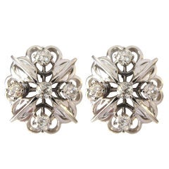 Elegant pair of Starburst White Gold and Diamond Earrings