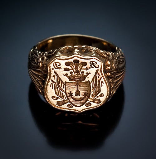 circa 1840

A very rare antique Russian armorial seal ring with the crest of the Yaminsky family.

The shaped shield of the ring is centered with the Yaminsky coat of arms, surrounded by military trophies - banners, cannons, cannonballs, and