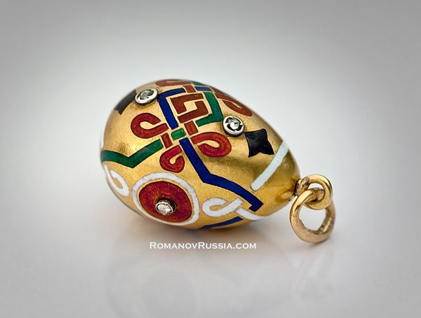 A superb gold, guilloche, and champleve enamel miniature egg pendant in the Russian Revival Style of the 1870s-1880s by Carl Faberge, Court jeweler to the Tsars.

One of the major publications which inspired the Russian Revival, was Victor