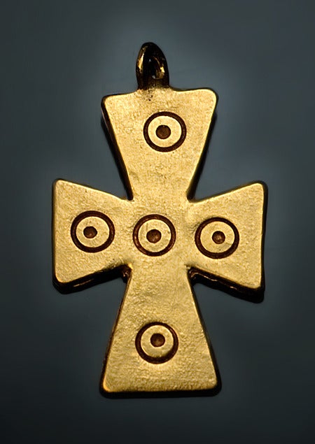 The Byzantine Empire, circa 9th -12th century

The gold cross is incised with five concentric circles representing the Five Holy Wounds of Christ - the five piercing wounds suffered during the Crucifixion.

 26 x 15 mm ( 9/16 x 1 in. )

The