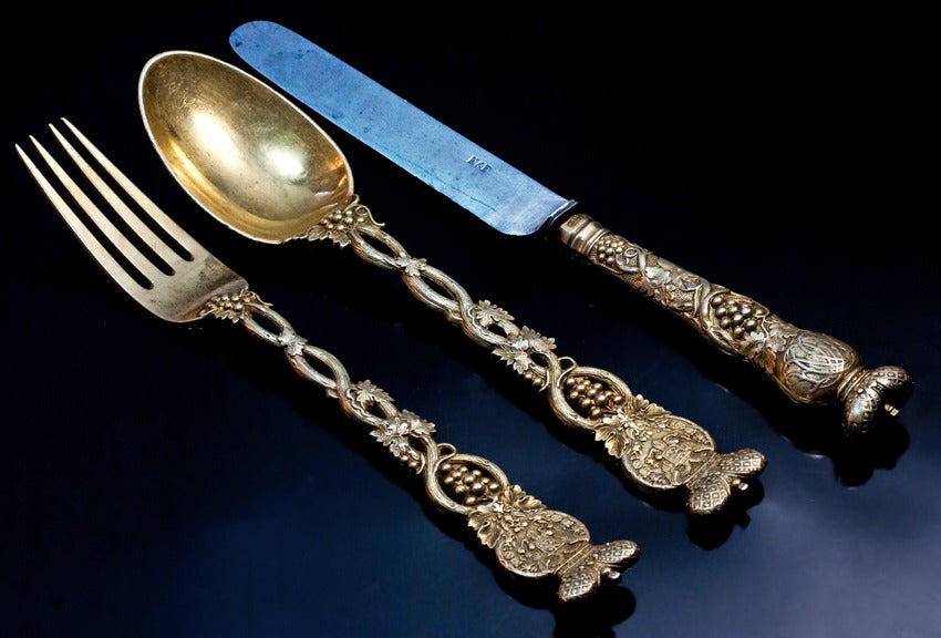 A gilded silver and steel 3 piece flatware set from the Grape flatware service made for Grand Duke Alexander Nikolaevich, later Tsar Alexander II (ruled 1855-1881). Made in St. Petersburg in 1847 by the firm of Nichols & Plincke, silver and