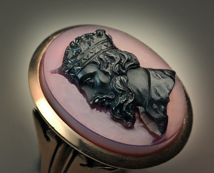 A Late 19th Century Agate Cameo Gold Ring

 The 14K rose gold ring is set with an oval agate cameo finely carved in high relief with a bust of a medieval king.

Height 23 mm (15/16 in.)

 US ring size 7 1/2  (18 mm)