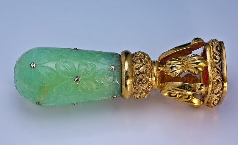 A 19th Century Antique Gold Mounted Carved Jade, Carnelian and Diamond Desk Wax Seal

 circa 1870s

 The jade handle is carved with clovers  in oriental taste.  Each clover is highlighted with a bezel-set old mine diamond. 

 The design and
