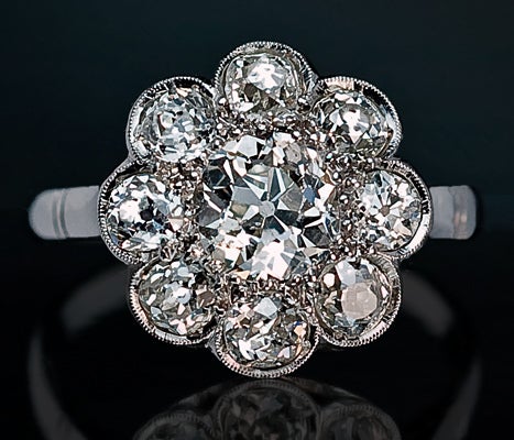 Antique Diamond Platinum Cluster Engagement Ring In Excellent Condition In Chicago, IL