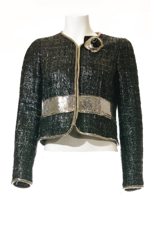 This is a Fashionista’s dream comes true! A rare, rare, rare limited edition - A Cross-Over of Donnatella of Versace and Karl Lagerfeld of Chanel (Post 2008 - very limited edition). This jacket has all the major design hallmarks of the two of the