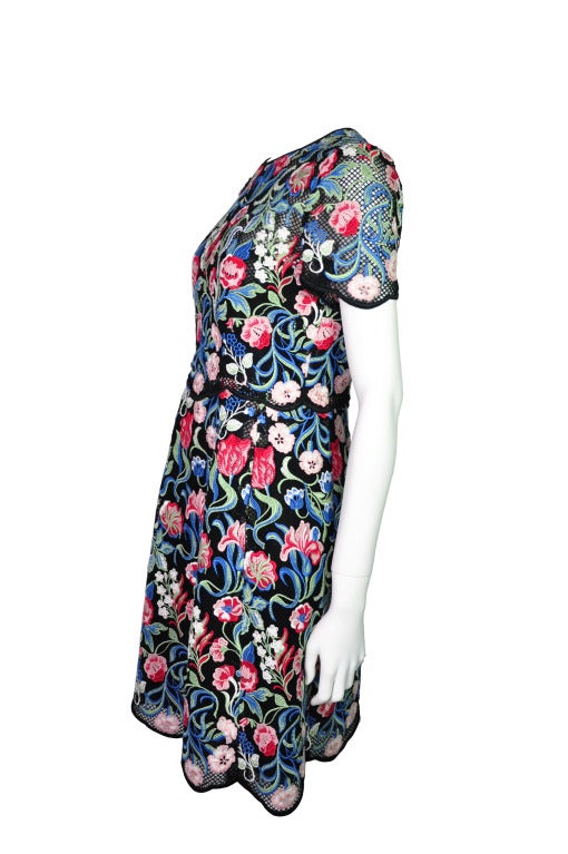A Sold-out Valentino 2013 F/W tapestry lace floral dress with short sleeves. Mesh lining with stiffened hem.  Zipped back, partially lined in stretch silk.
100% Polyamide, Lining: 91% Silk & 9% Elastane