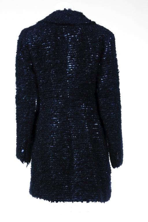 A rare and classic blue hues fully sequined mohair double breasted coat by Tom Ford for Gucci in 90's.  The craftsmanship is exceptional and the condition of this coast likes new.  Only a few have been made.