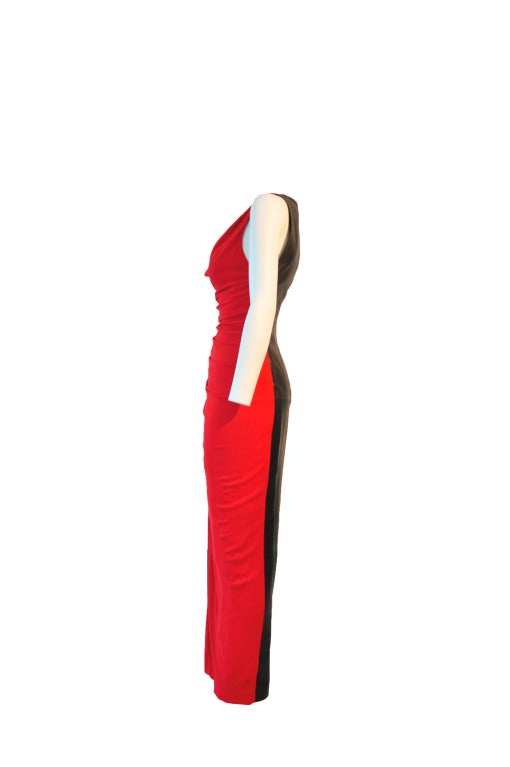 One of the iconic red-carpet diva evening dress from Gianni Versace himself, a well combination of black leather and red ruched jersey.  High front slit and back zipper closure.