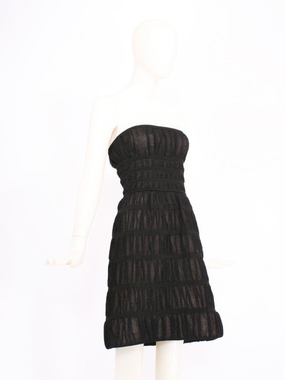 ALAIA black a-line strapless dress. Built-in boning and exquisite construction. Mint Condition. Unusually made with silk. 
Size Small
Bust: 32-34