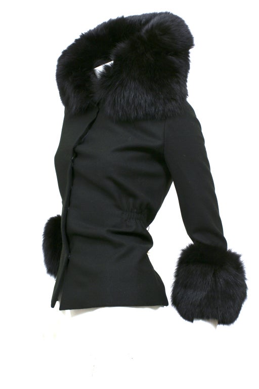 John Anthony Black Fox Fur Jacket has a large fur collar that can be raised or lowered. Big Fur Cuffs and a fitted silhouette. Jacket is made of wool. Made in the USA.

Store Location:

DEVORADO
436 E.9th St.
NYC, NY 10009
Store Hours: