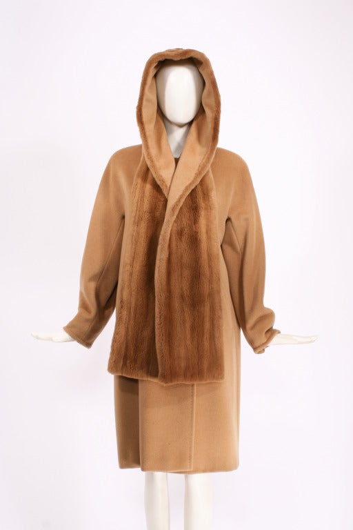 MAXMARA Camel Fur and Wool Coat with Hood. Plush separate camel hair hood. Classic cut. Excellent condition.

Store Location:

DEVORADO
436 E.9th St.
NYC, NY 10009
Store Hours: Mon-Sat 12-7pm, Sun 1-7pm