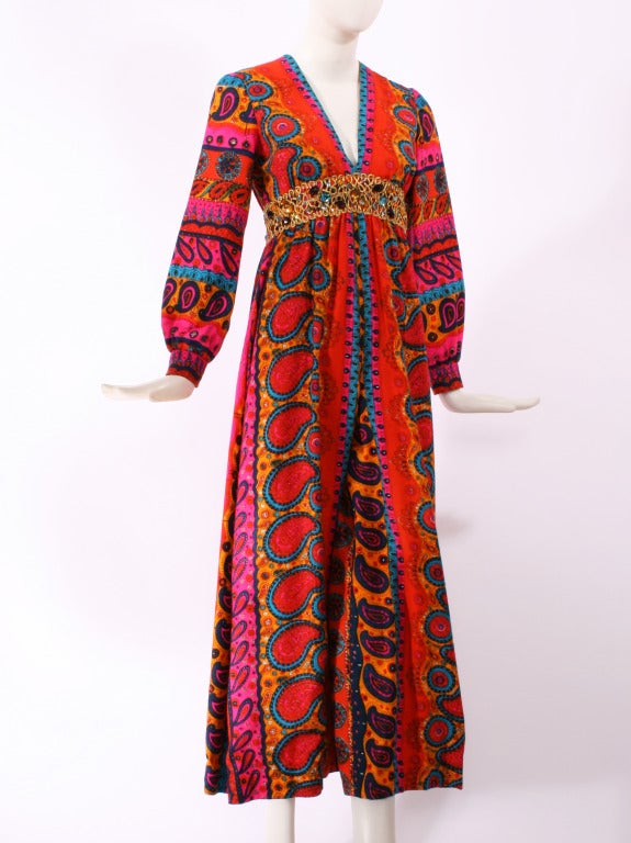 Malcolm Starr/ Malcolm Charles Jumpsuit from the late 60s-early 70s. Statement piece in vibrant colors with gem embellishment around the waist.
Size s-m. Excellent condition.

Store Location:

DEVORADO
436 E.9th St.
NYC, NY 10009
Store