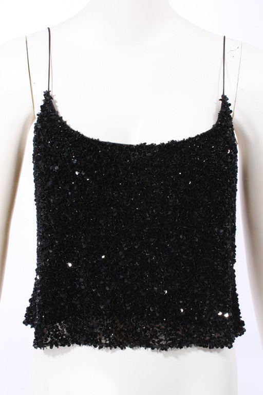 Badgley Mischka Hexagonal Black Sequins Top.
Beautiful unique hexagonally shaped black sequins embellish this sexy top. Perfect for the holidays. New Condition.

Store Location:

DEVORADO
436 E.9th St.
NYC, NY 10009
Store Hours: Mon-Sat
