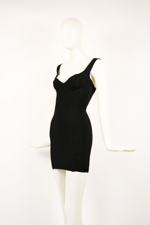 A very sexy little black dress by Alaia. Seamed to accentuate the body as only Alaia does. Has stretch and is very figure flattering. It is marked medium but fits more like a small. Excellent Condition.