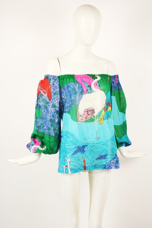 Hanae Mori 1970's Off-Shoulder Blouse. Gauzy cotton blouse with gorgeous birds of paradise print. Vibrant hues of pink, blue green and red.
Can be worn several ways. Excellent condition.