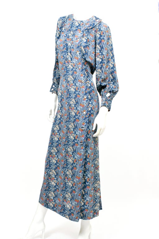 Oscar de la Renta floral maxi dress. Colors are a combination of blues, greens, white, pink and sienna. Stunning glass button detail.

Store Location:

DEVORADO
436 E.9th St.
NYC, NY 10009
Store Hours: Mon-Sat 12-7pm, Sun 1-7pm