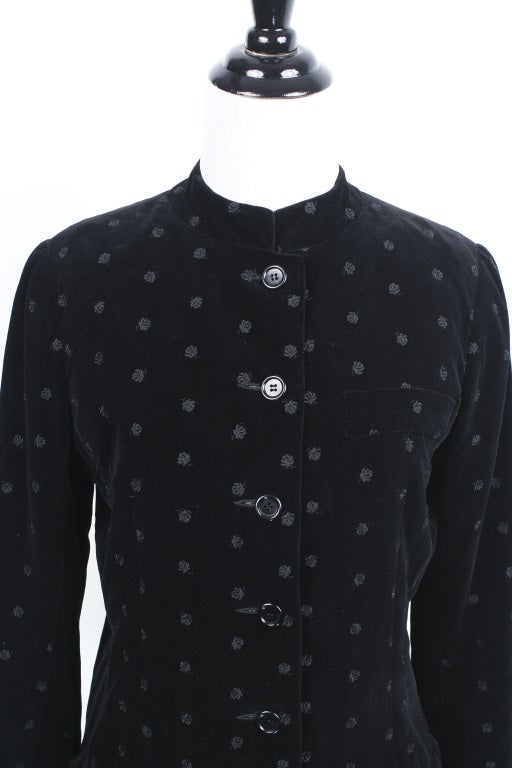 Iconic 1970s YSL Black Velvet embroidered Jacket. Mandarin collar, menswear style jacket. Medium. Excellent Condition.

Store Location:

DEVORADO
436 E.9th St.
NYC, NY 10009
Store Hours: Mon-Sat 12-7pm, Sun 1-7pm