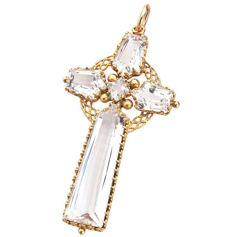 Trimmed in a regal 18kt gold pronged frame,  five pure rock crystal prisms gleam like the north star on a clear winter's evening. When looking at crystal, realize and imagine that the body brings out ten times the beauty of a photograph.  The