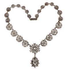 A Cut Steel Necklace of Snowflakes and Flowers c. 1820-30