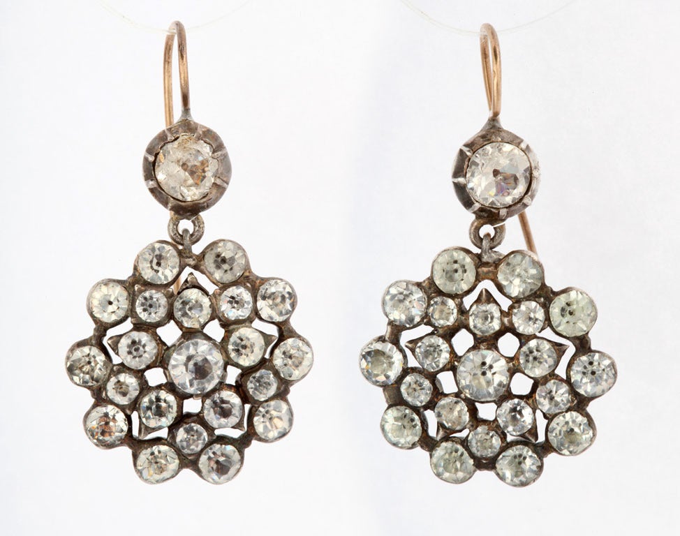 All the workmanship and design of fine Georgian paste is apparent in these brilliant earrings. Paste was an art form in which stones, harder than glass, were hand cut, polished and set in the same manner as precious gemstones, The work was time