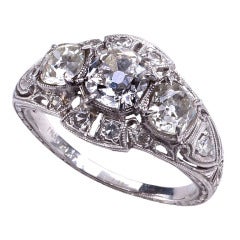 Vintage Breathtaking Three Diamond Platinum Ring