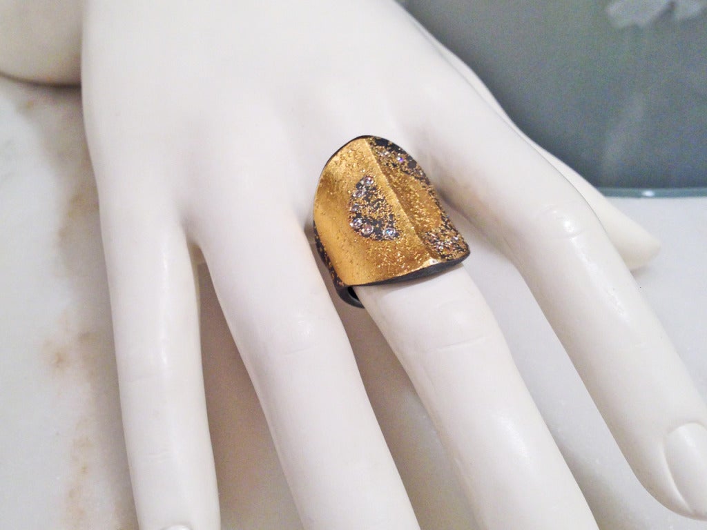 One-of-a-Kind Reflector Ring in 24k gold and sterling silver with 0.13 carats of round brilliant-cut diamonds.