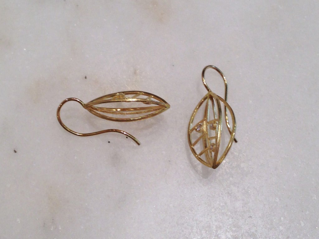 Open Leaf Earrings in 18k yellow gold with diamonds (0.06tcw).