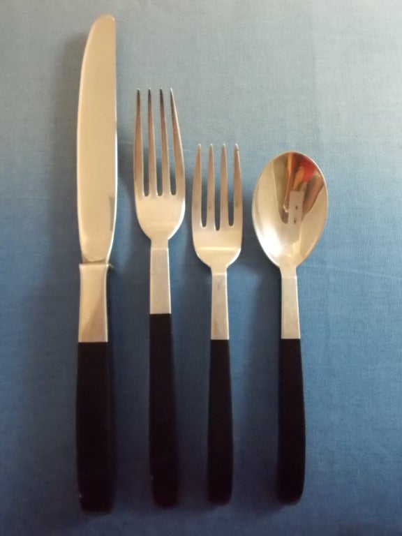 Contrast by Lunt Sterling Silver, Designed by Nord Bowlen
Country: USA
Period: 1979

As featured in the Modernism In American Silver Book - CONTRAST BY LUNT sterling silver w/black nylon handles. This 4-piece place setting includes the following