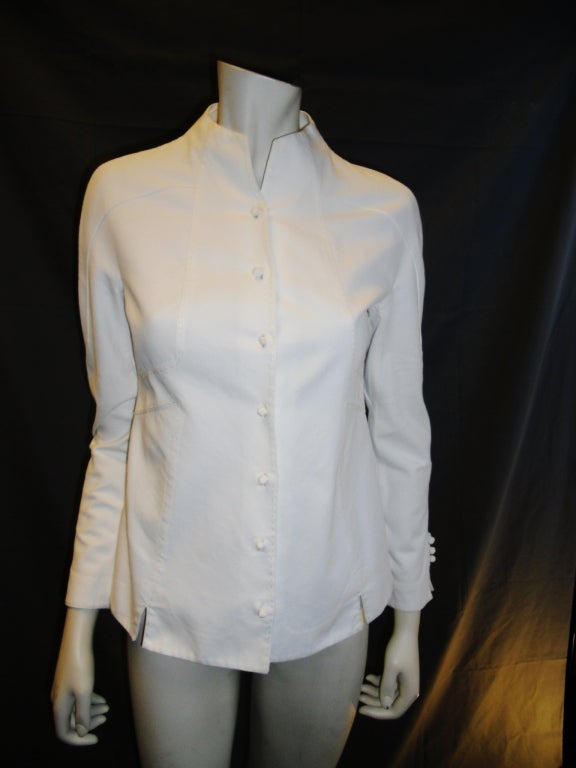 Beautiful crisp Chado Ralph Rucci White Cotton Pique shirt. Knot button front closure. Size 6.
Bust: 36