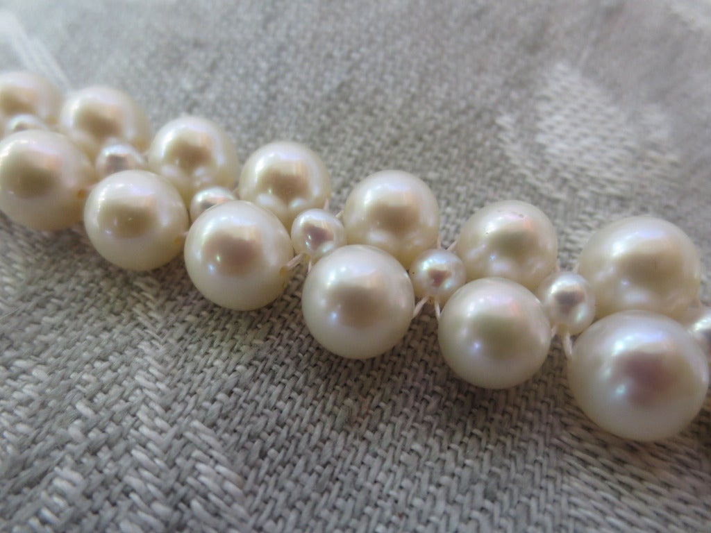 Women's Woven Pearl Bracelet with Vintage Floral Gold Clasp