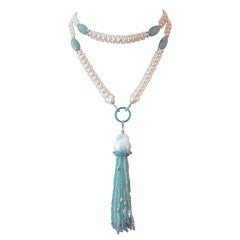 Superbe collier à pompon en aigue-marine:: perles et topazes bleues