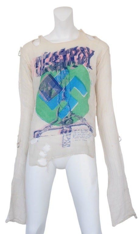 Seditionaries white cotton gauze 'Destory' muslin . Exaggerated sleeve length with clip and 'D' ring detail. c. 1976 - 1979