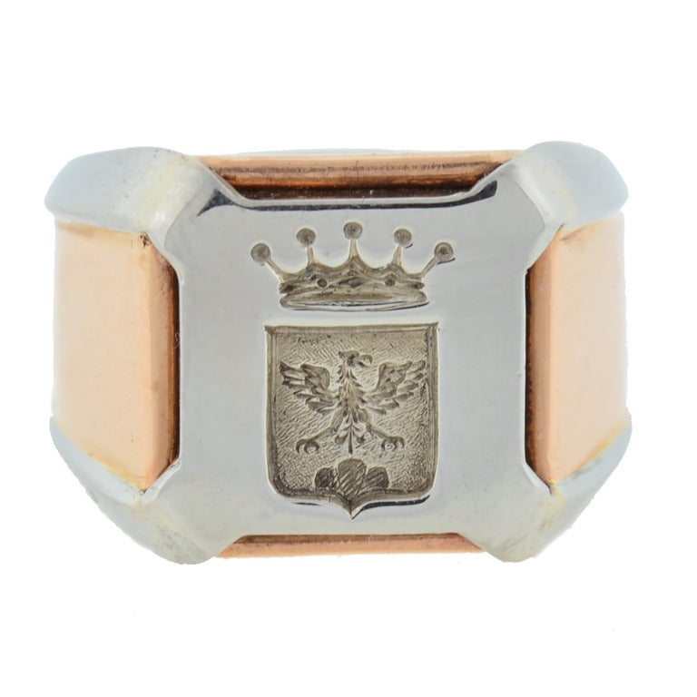 A signet ring can be represented with a simple smooth seal, or with an intaglio, which is created by carving below the surface of a stone. Its purpose would have been to seal the wax of a letter or note. 

This unusual mixed metals signet ring
