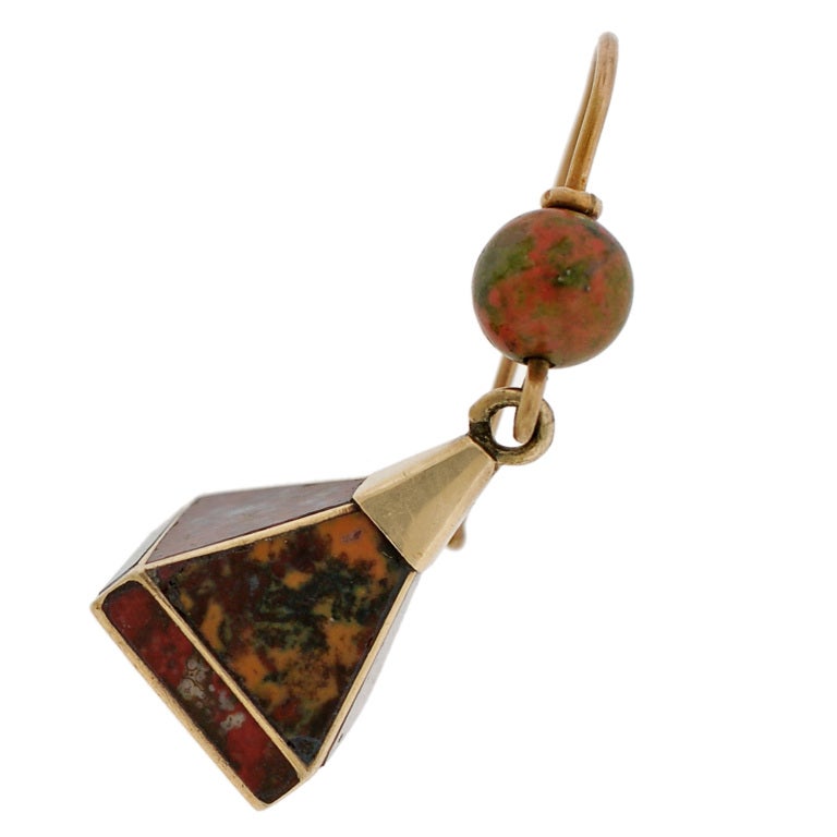 A wonderful pair of Scottish agate earrings from the Victorian (ca1880) era! Each of these hanging earrings has a stylish pyramidal design crafted in 14kt gold. The combination of Scottish agate stones are set within the surface, giving interesting